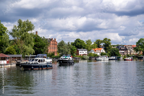 queue of motorboats on lake Malchow in the Mecklenburg Lake District, Germany