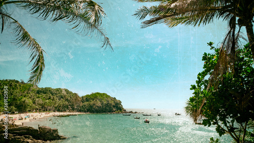 Sun  sea  summer. The image is stylized as a film photo.