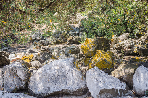 Rocks of volcanic origin on the beach of the island of Lihada-Greece 