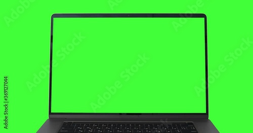 Dolly shot of the MacBook Pro 16 inch model Laptop mockup with green screen, front view, isolated on keyed chromakey. Empty space for your advertising. Perfect for your content