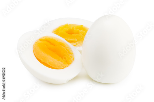Wallpaper Mural Single whole boiled egg with halved egg isolated on a white background Torontodigital.ca
