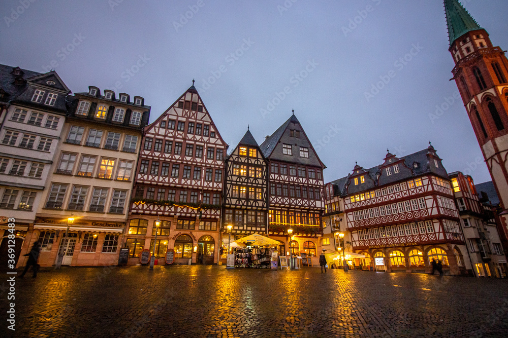 Medieval historical buildings at old town square Römerberg in Frankfurt, Germany.