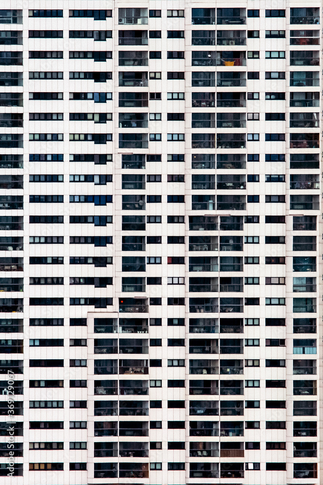 Modern facade of a building full of windows Modern facade of a building full of windows