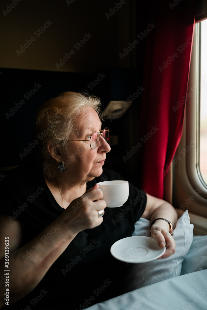 Senior woman in the train Senior woman in the train