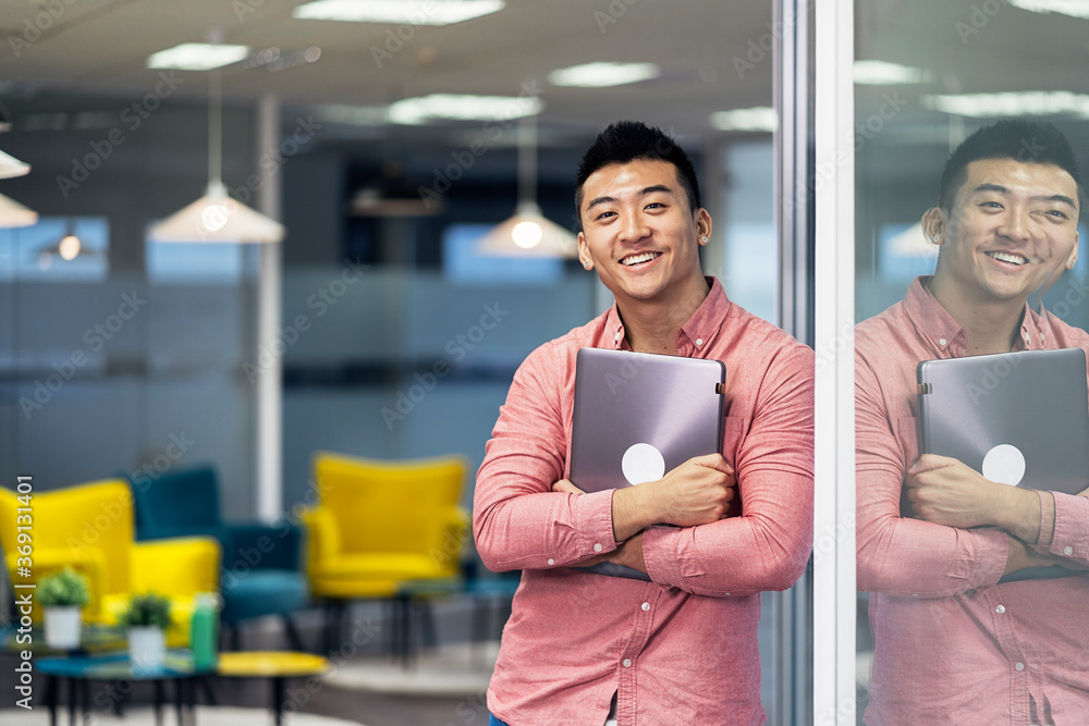 © Santi Nunez/Stocksy - Portrait of a handsome business man looking at camera