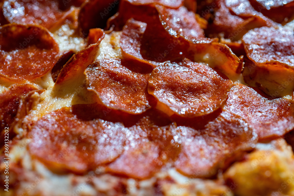 close up of a slice of pizza close up of a slice of pizza