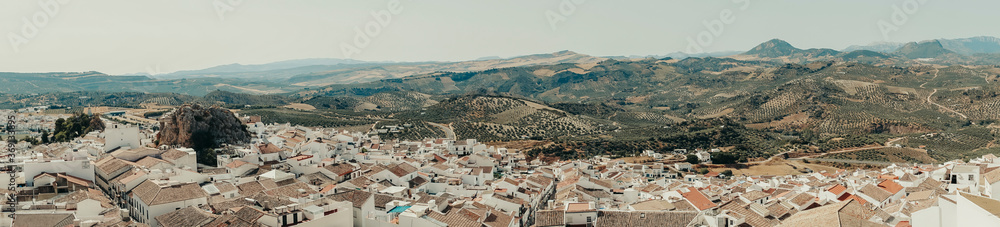 Panoramic of old white town on top.