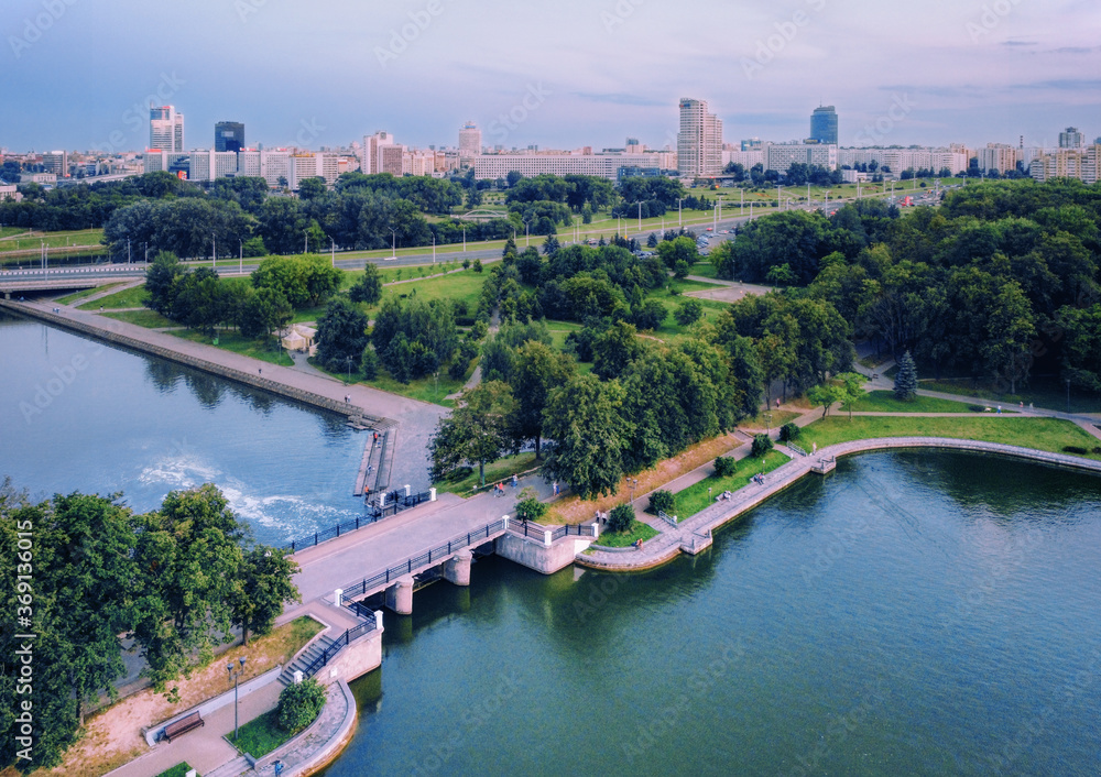 Aerial view of Minsk cityscape and a pedestrian bridge in the Victory Park in the city center