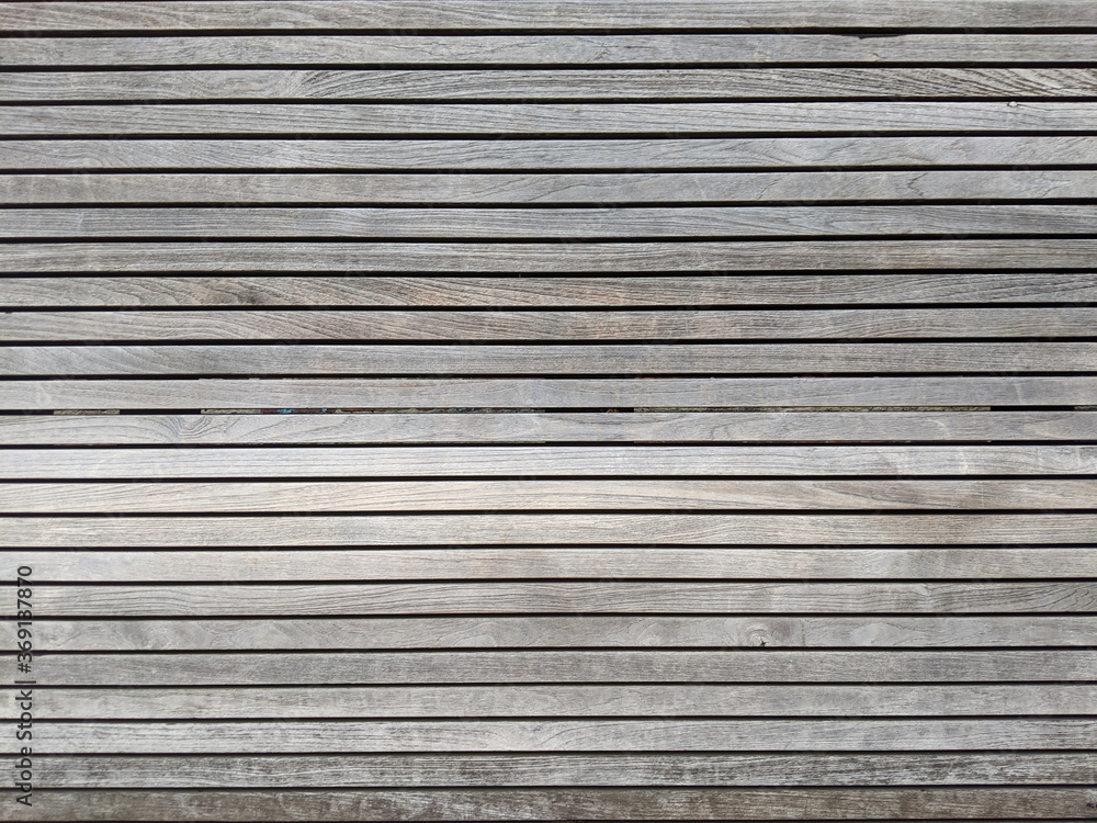 Close-up of old wood texture of pallets background. Horizontal lines of wooden boards Close-up of old wood texture of pallets background. Horizontal lines of wooden boards