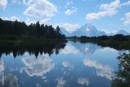 Reflective lake water with Mount Moran