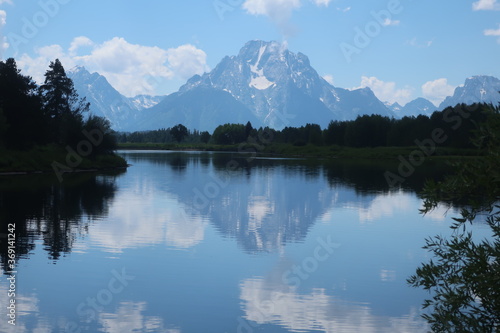 Reflective lake water in Tetons National Park in Wyoming