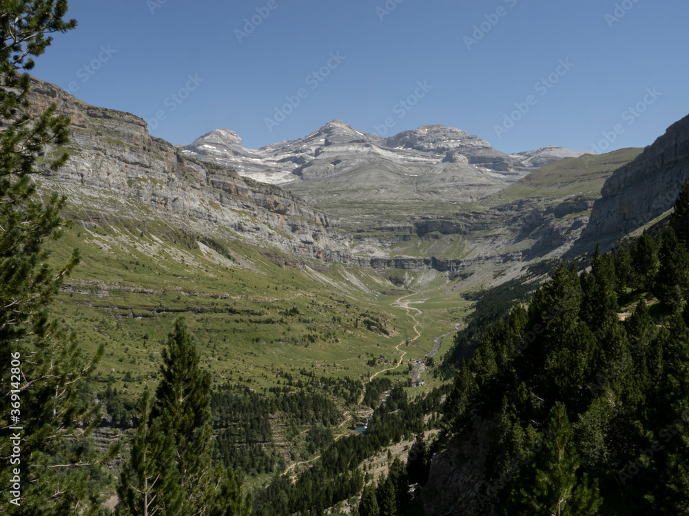 Valley with river among majestic mountains
