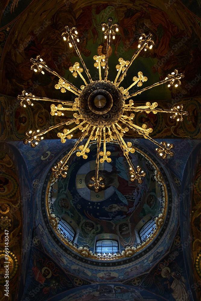 Chandelier and ceiling mosaics in orthodox Church of the Savior temple, Saint Petersburg, Russia