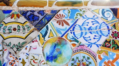 Details with Ceramic tiles in Antoni Gaudi's Park Guell, Barcelona, Spain photo
