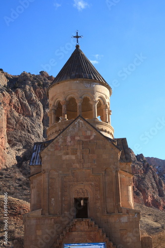 Beautiful Noravank armenian monastery and church, orange, with a colorful blue sky, Armenia