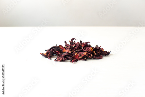 White Wooden Table with Hibiscus Flower / Roselle (Hibiscus sabdariffa)