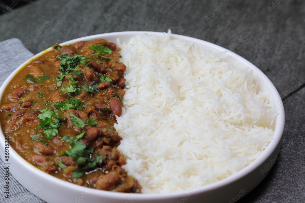 A platter of Indian red Kidney beans curry or Rajma Masala and rice