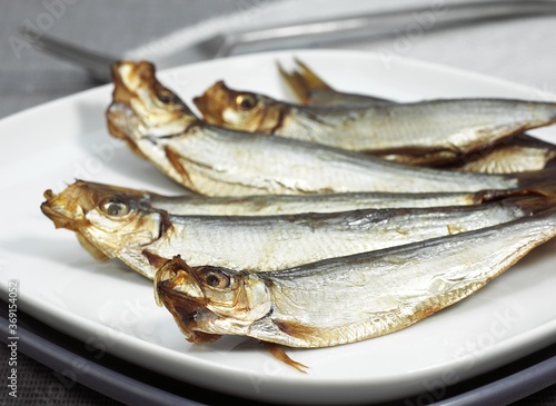 SPRAT sprattus sprattus, SMOKED FISH ON PLATE