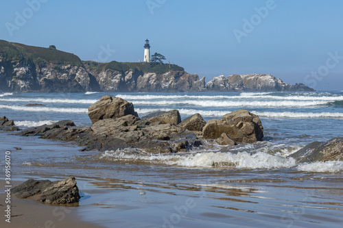 Yaquina Head Lighthouse in Oregon with Rocky Beach photo