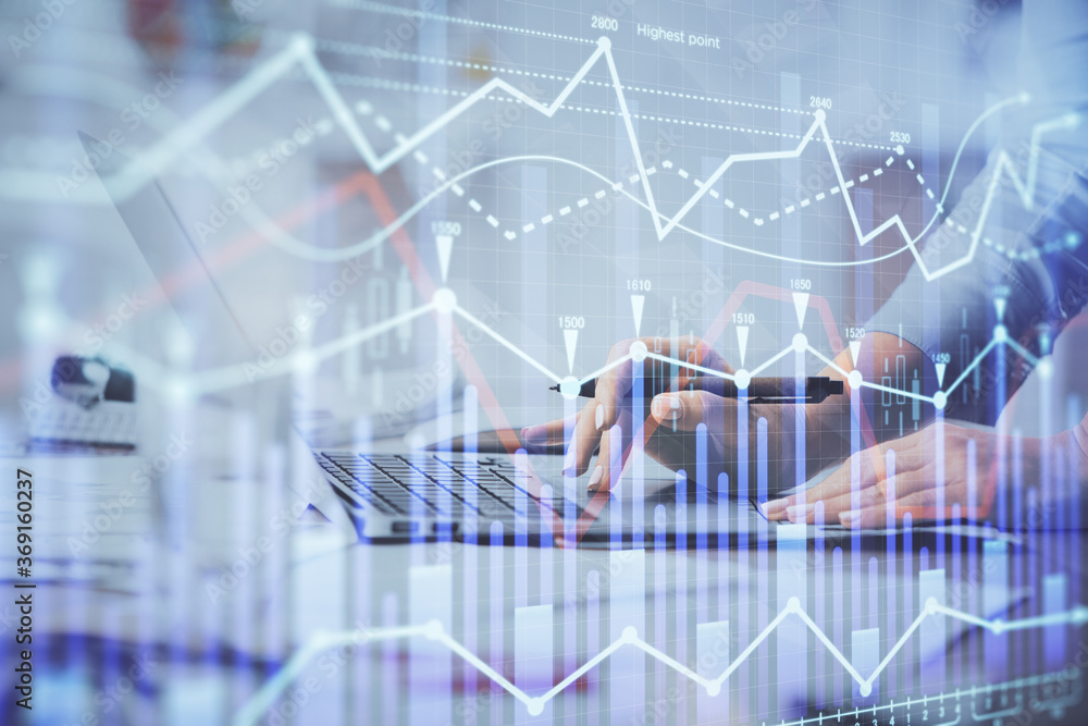 Multi exposure of woman hands typing on computer and financial chart hologram drawing. Stock market analysis concept.