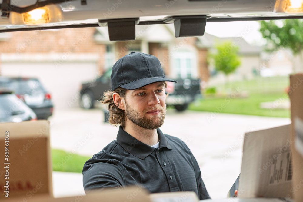 Shipment: Man Getting Boxes Out Of Delivery Van Shipment: Man Getting Boxes Out Of Delivery Van