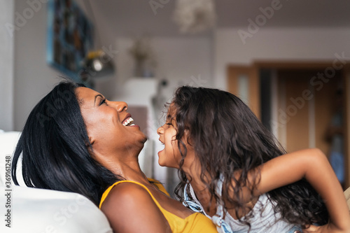 Happy family having fun at home photo