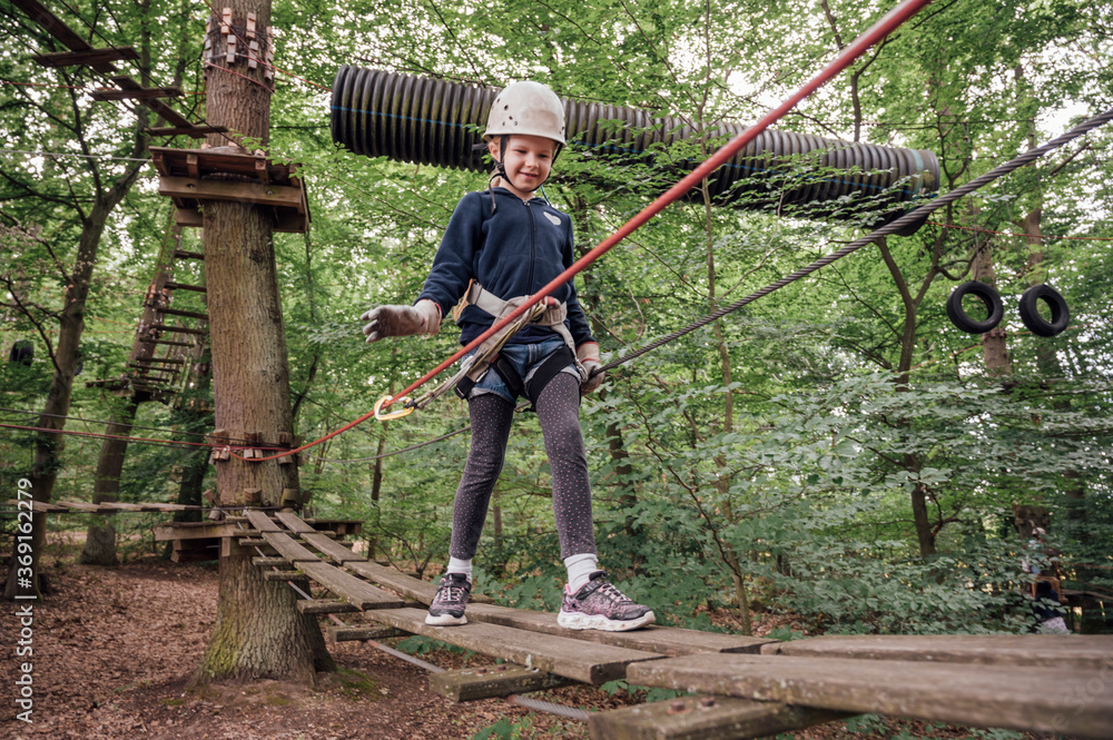 People: Girl at a high wire park People: Girl at a high wire park