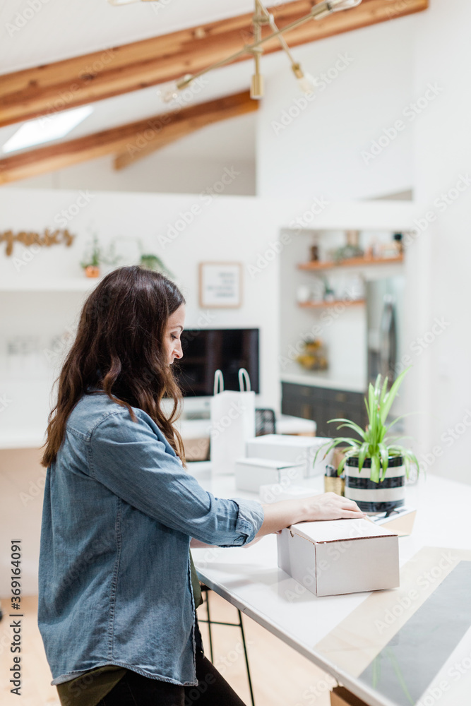 Female Business Owner Packing Orders Female Business Owner Packing Orders