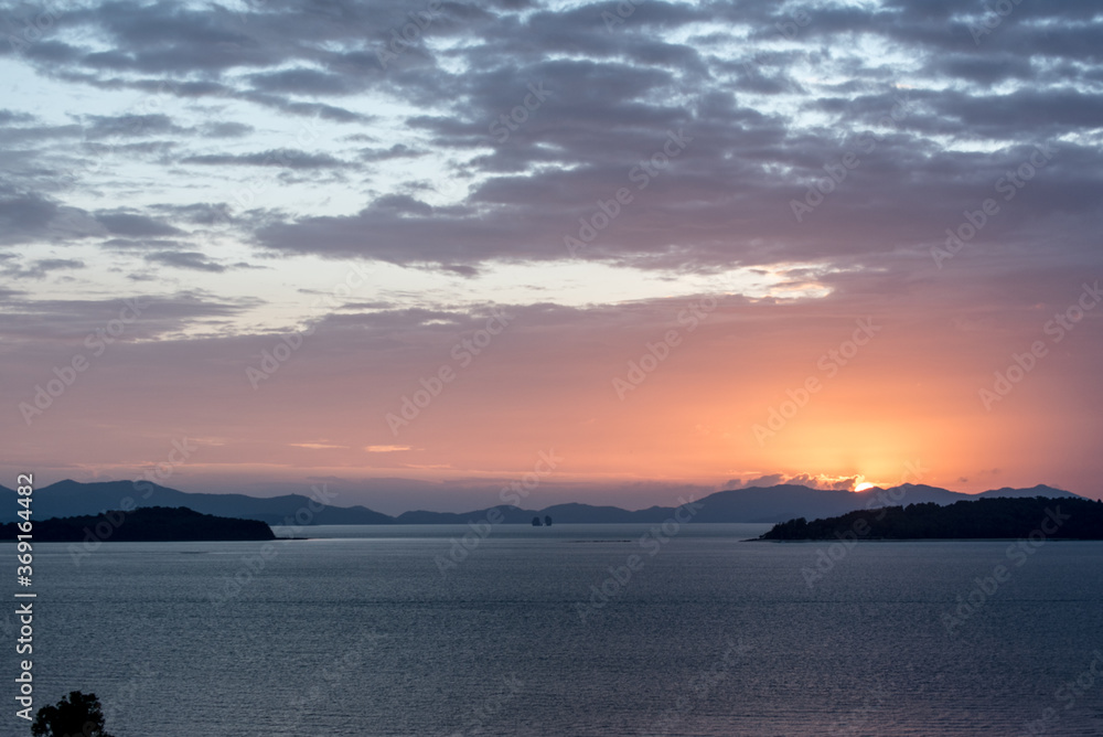 Beautiful first light from sunrise with orange sky Beautiful first light from sunrise with orange sky