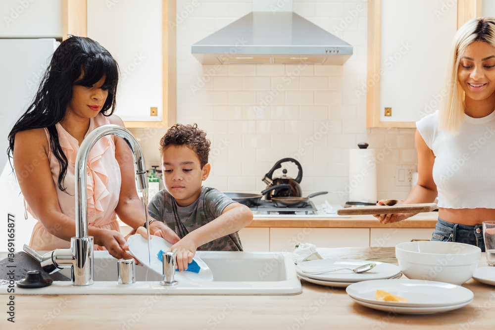 Mother Washes Dishes with Son Mother Washes Dishes with Son