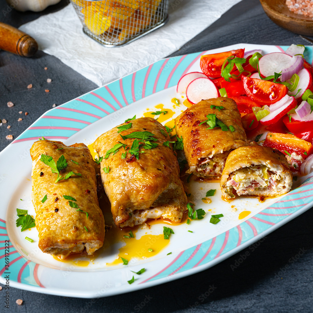 Vegetable roulade from roast pork loins with salads Vegetable roulade from roast pork loins with salads