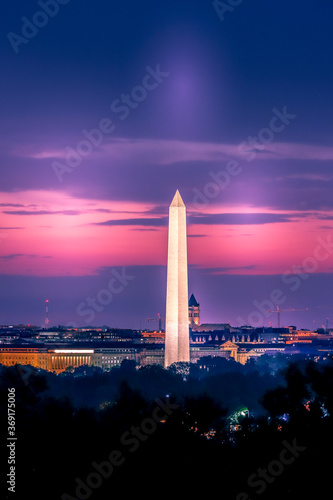 Washington Monument at sunrise with clouds in the background Washington DC, USA 