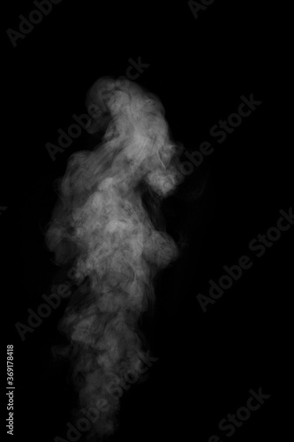Figured smoke on a dark background. Abstract background, design element, for overlay on pictures