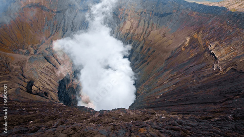 Photo of smoke volcano crater on Java island