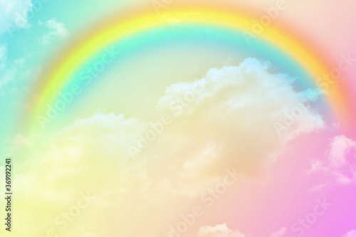 Fantasy magical landscape the rainbow on sky abstract with a pastel colored background and wallpaper.  © masterjew