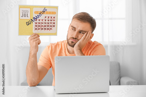 Sad man with calendar and l...