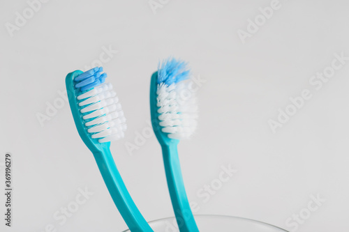 Tooth brushes on light background