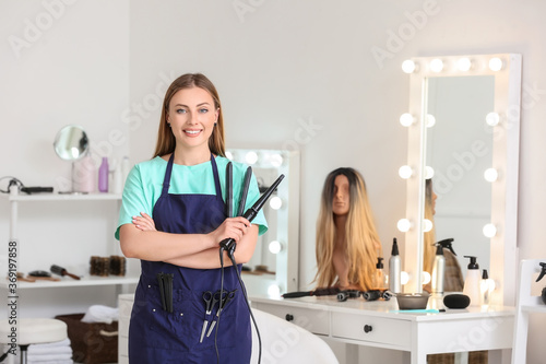 Portrait of female hairdres...