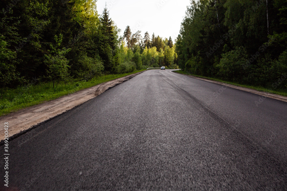 Fototapeta premium Asphalt road outside the city
