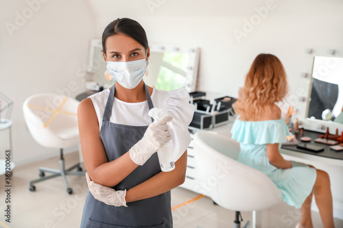 Female makeup artist wearin...