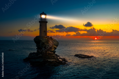 Obraz na płótnie The beautiful Lighthouse Tourlitis of Chora in Andros island, Cyclades, Greece w salonie