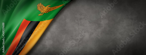 фотографія Zambian flag on concrete wall banner