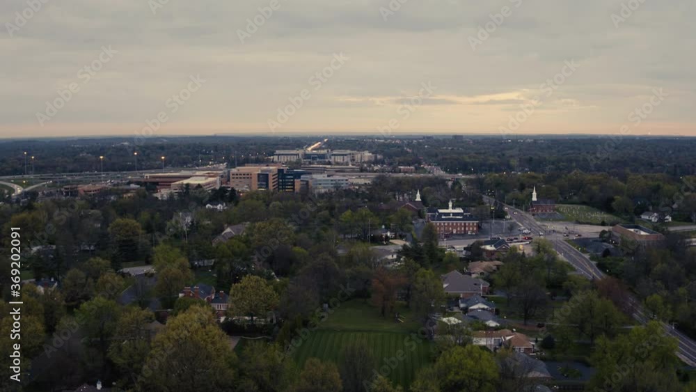 Early morning aerial of neighborhood and hospital Early morning aerial of neighborhood and hospital