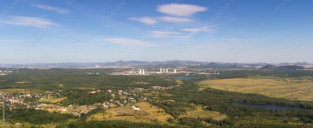 Aerial panoramic view to city Litvinov from lookout. Czech city and landscape