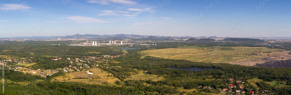 Aerial panoramic view to city Litvinov from lookout. Czech city and landscape