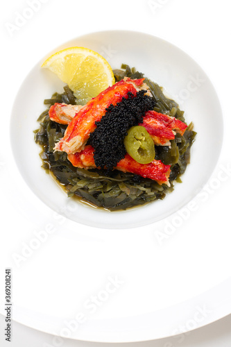 King crab, lemon, flying fish caviar, seaweeds, soy sauce and holopeno pepper