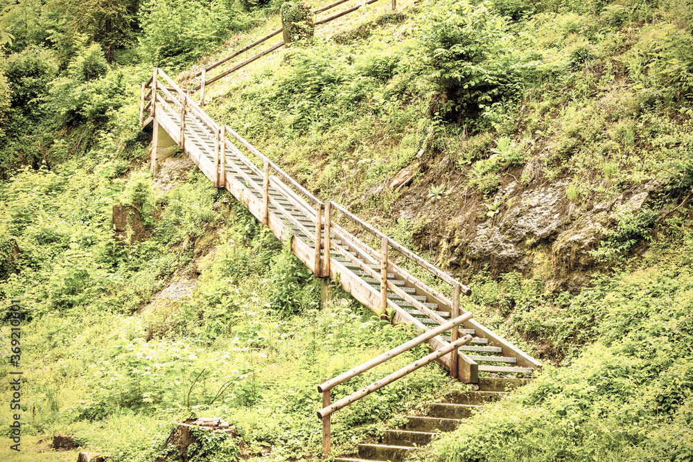 Austrian landscape with wooden staircase Austrian landscape with wooden staircase