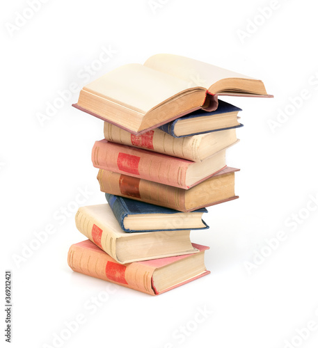 Stack of books with white sheets isolated on a white background