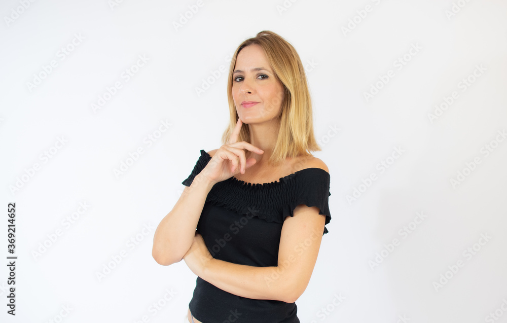 Beautiful blonde woman in black shirt smiling Beautiful blonde woman in black shirt smiling