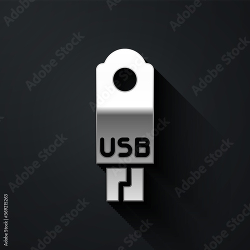 Silver USB flash drive icon isolated on black background. Long shadow style. Vector Illustration.